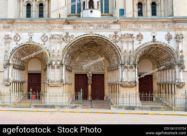Dijon, Burgundy / France - 27 August 2019: close up view of the three doors of the historic Saint Michel Church in the old city center of Dijon in Burgundy
