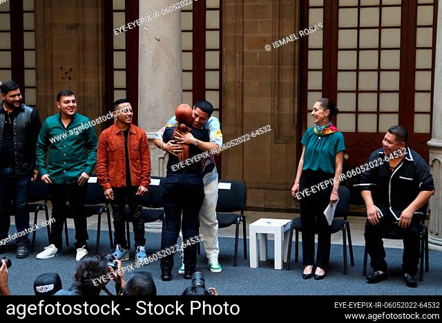 MEXICO CITY, MEXICO - MAY 6, 2022: Vocalist and founder of Grupo Firme, Eduin Cazares receives a recognition from Mayor Claudia Sheinbaum during a meet at City...