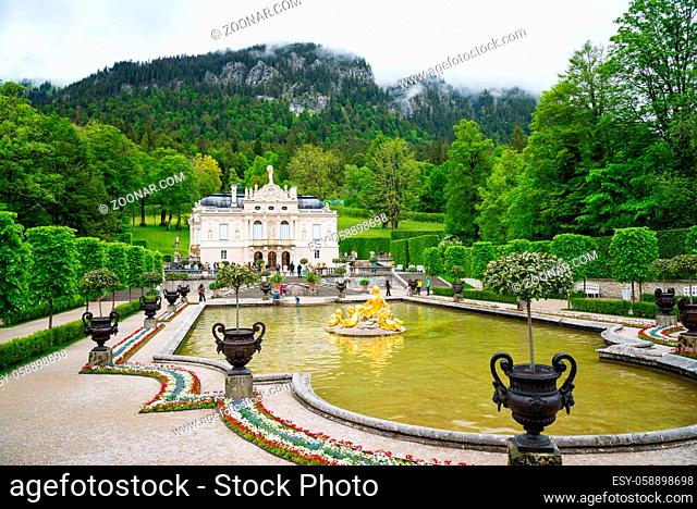 Ettal, Germany - June 5, 2016: Linderhof Palace is a Schloss in Germany, in southwest Bavaria near Ettal Abbey. Fountain group Flora and puttos