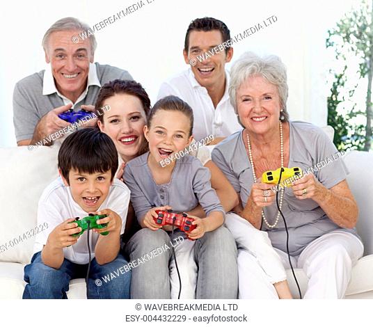Family having fun playing video games