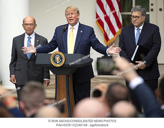 United States President Donald J. Trump, center, delivers remarks on citizenship and the census in the Rose Garden of the White House in Washington