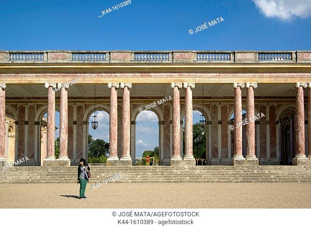 Colonnade in pink Languedoc marble at the Grand Trianon of Versailles Palace, combining French and Italian architectural styles