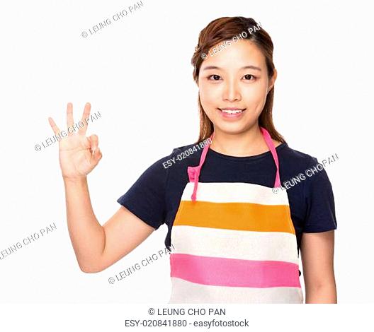 Housewife with ok sign