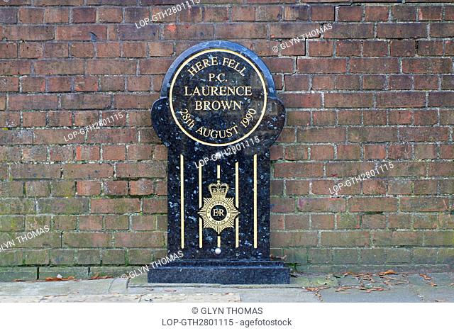 England, London, Hackney. Metropolitan Police memorial to PC Laurence Brown who was shot dead with a sawn-off shotgun as he approached a suspect on Pownall Road