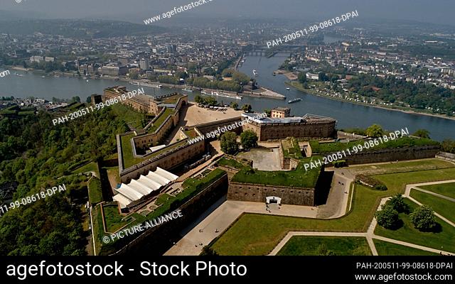 30 April 2020, Rhineland-Palatinate, Koblenz: Ehrenbreitstein Fortress, the largest part of the major Koblenz fortress, is situated high above the Rhine with a...