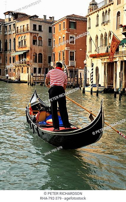 Evening picture of a gondolier on the Grand Canal, Venice, UNESCO World Heritage Site, Veneto, Italy, Europe