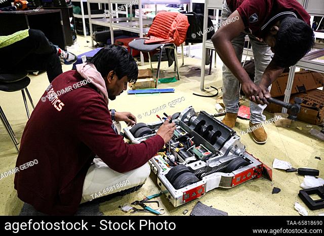 RUSSIA, MOSCOW - DECEMBER 16, 2023: Members of the DS Robotics team (India) attend the final of the Battle of Robots international championship at the...