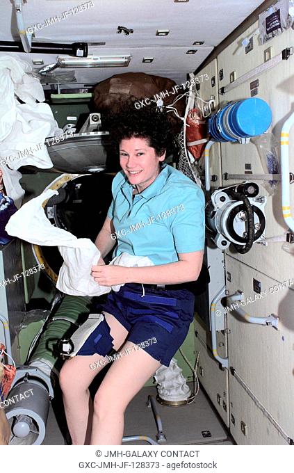Astronaut Susan J. Helms, Expedition Two flight engineer, is pictured in the Zarya or Functional Cargo Block (FGB) of the International Space Station (ISS)