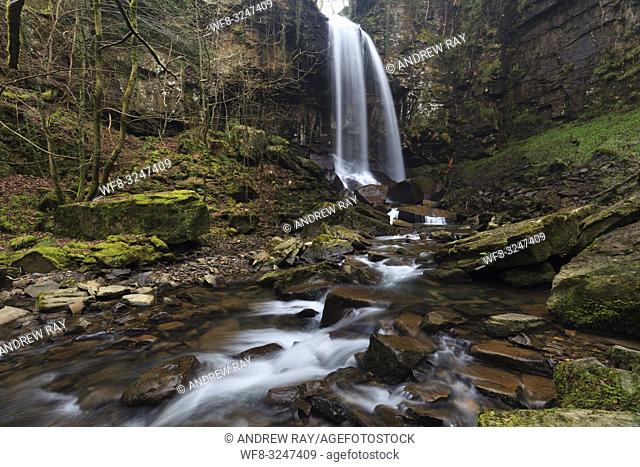 Melincourt Waterfall in the Vale of Neath in South Wales, captured in mid February using a long shutter speed to blur the movement of the water coming over the...
