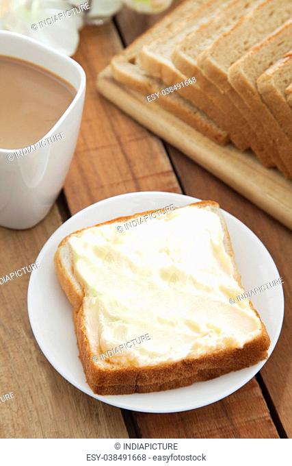 Buttered toast with cup of tea