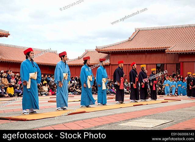 Okinawa, Japan - January 02, 2015: Dressed-up people performing a show for spectators at the traditional New Year celebration at Shuri-jo castle