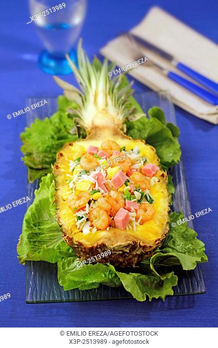Stuffed pineapple with rice and prawns