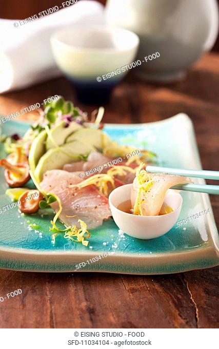 Sashimi made with hamachi and avocado