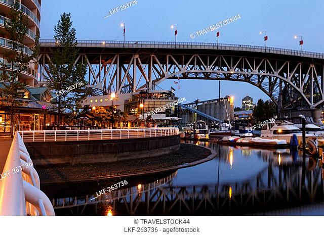 Promande and small Marina at False Creek at twilight, Granville Bridge, Vancouver, Canada, North America