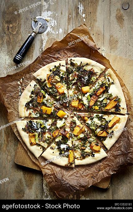 Roasted butternut squash, kale and broccoli pizza