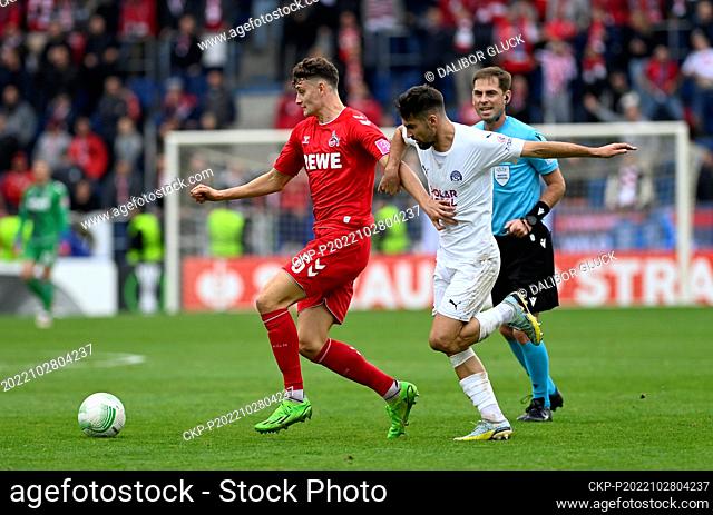 Eric Martel of Cologne, left, and Michal Travnik of Slovacko in action during the Group D, 5th round soccer match of the European Conference League 1