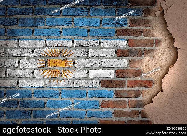 Dark brick wall texture with plaster - flag painted on wall - Argentina