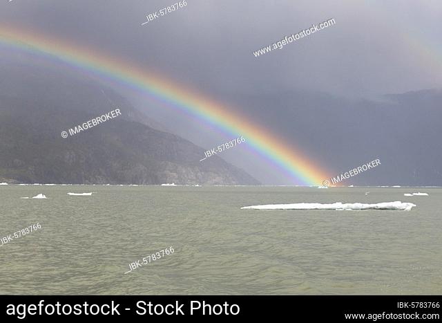 Rainbow over Caleta Tortel, Aysen Region, Patagonia, Chile, South America