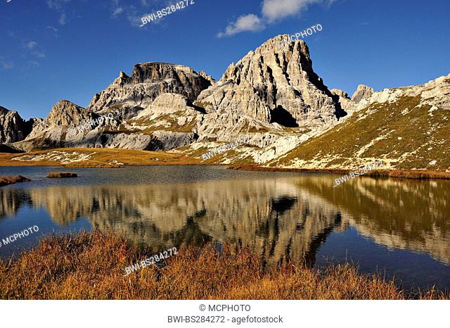 Scarperi mountain range seen across a lake, Italy, Dolomites, NP Sesto Dolomites