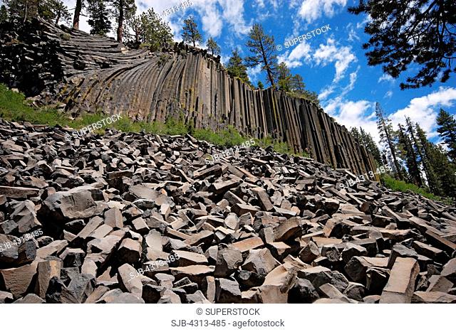 Devil's Postpile National Monument, near Mammoth Lakes, California, is a formation of columnar basalt lava that settled into hexagonal and similar shapes during...