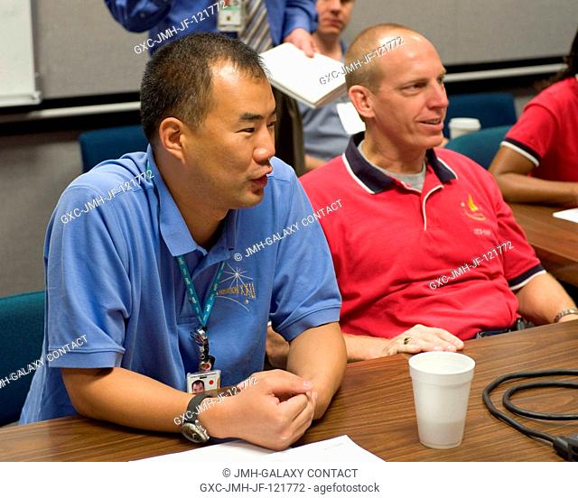 Japan Aerospace Exploration Agency (JAXA) astronaut Soichi Noguchi (left), Expedition 2223 flight engineer; and NASA astronaut Clay Anderson