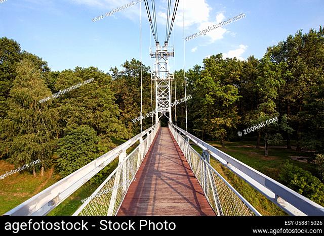 suspension bridge through the river Neman, intended for movement of pedestrians. Belarus, Mosty