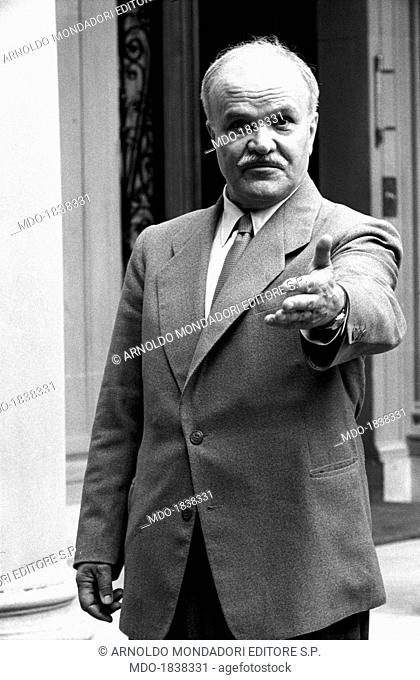 Soviet Minister of Foreign Affairs Vyacheslav Molotov gesticulating toward the photographer at the Geneva Summit discussing issues about security