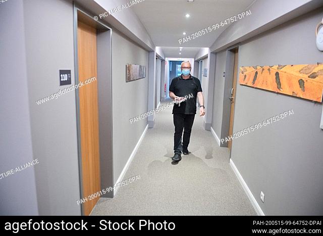 13 May 2020, Mecklenburg-Western Pomerania, Binz: Housekeeper Waldfried Breithaupt walks through the rooms every day, airing and operating taps and flushes to...
