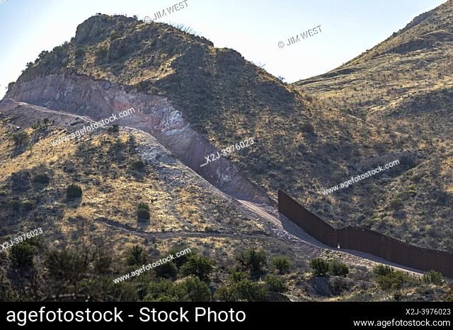 Douglas, Arizona - The U. S. -Mexico border fence ends abruptly in Guadalupe Canyon where construction workers blasted a gash in a mountainside