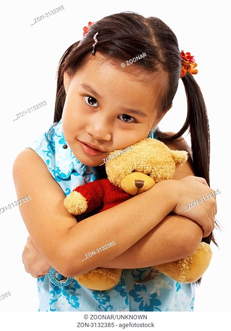 Teddy Bear Being Hugged And Cuddled By A Young Girl
