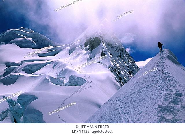 Mountaineer ascending Vallunaraju Mountain 5.686m, Cordillera Blanca, Peru