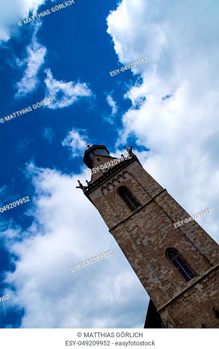 View to the St. Kilian church in the german city Korbach with cloudy sky