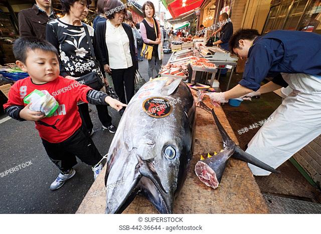 Customers at a fish market, Tsukiji Fish Market, Tokyo, Japan
