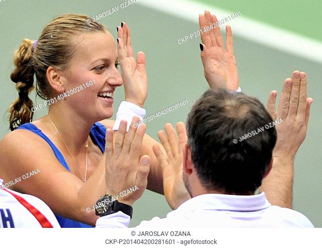 Czech Republic's Petra Kvitova celebrates after defeating Italy's Roberta Vinci in their Fed Cup semifinal tennis match in Ostrava, Czech Republic, Sunday