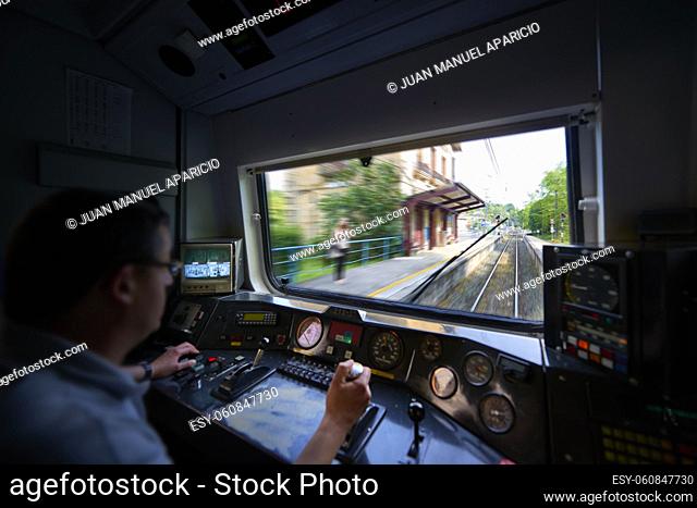 Interior view of the pilot hands and instrument panel cockpit of ancient train