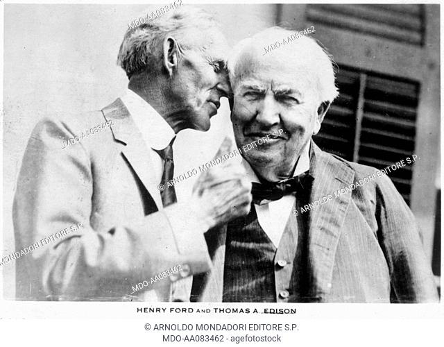 Henry Ford talking to Thomas Edison. The American industrialist Henry Ford, founder of the car manufacturer of the same name, meeting the American inventor