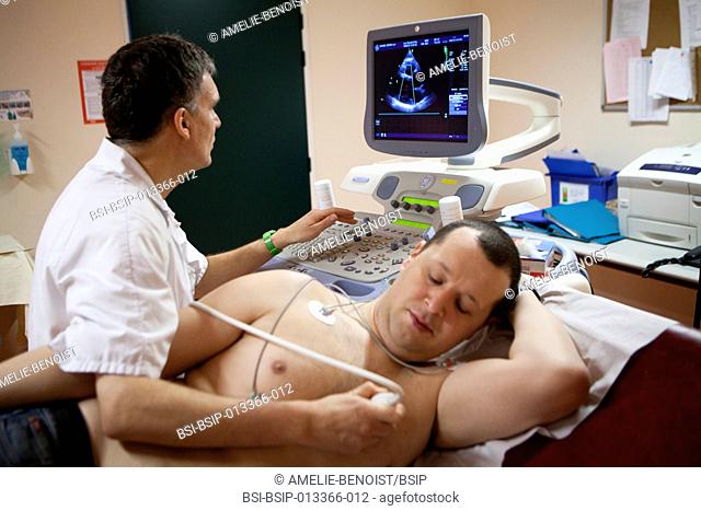 Reportage in the Les Grands Prés cardiac rehabilitation centre in Villeneuve Saint Denis, France. Echocardiogram with an ECG