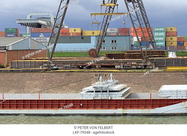 Trawler with opened loading hatch being at container harbour, Duisburg, North Rhine-Westphalia, Germany