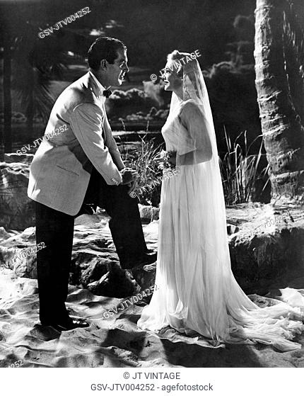 Fred MacMurray, Madeleine Carroll, on-set of the Film, Honeymoon in Bali, 1939