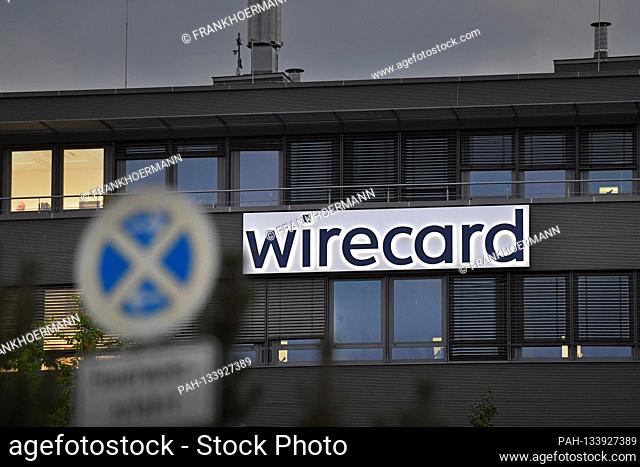 Evening mood at the headquarters of wirecard AG in Aschheim Dorafter. wirecard logo, company emblem, lettering, building, facade