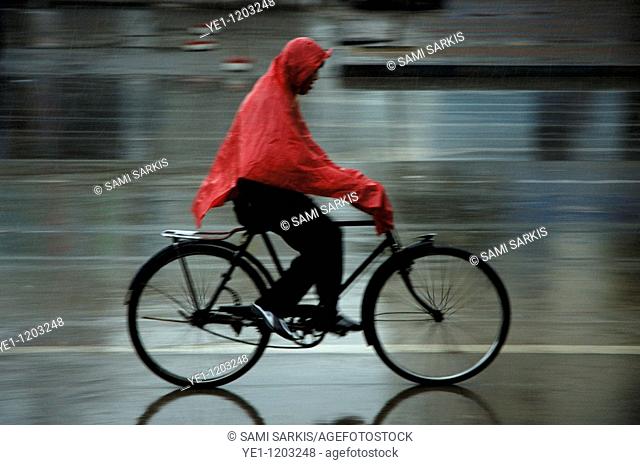 Man speeding on his bicycle under a storm, Datong, Shanxi, China