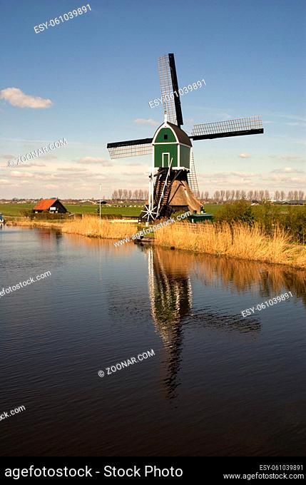 Windmill the Achterlandse Molen near Groot-Ammers in the Dutch region Alblasserwaard