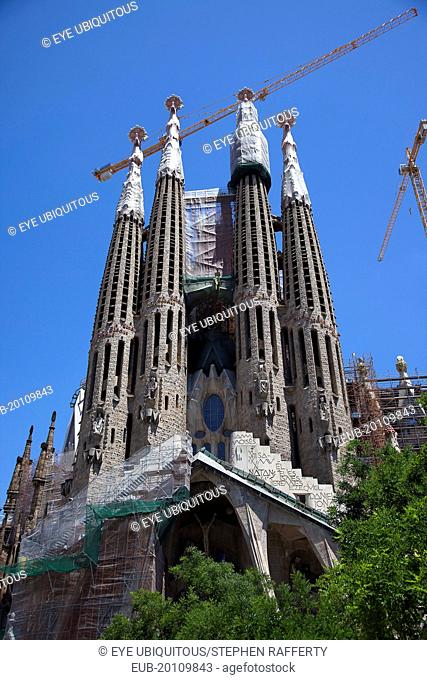 Eixample, exterior of La Sagrada Familia, designed by Antoni Gaudi