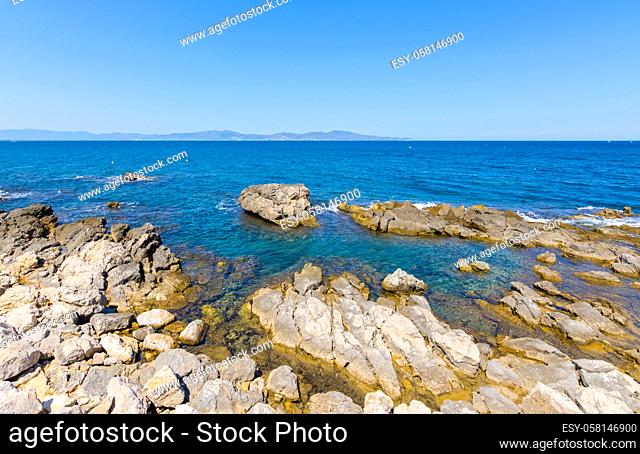 Rocky Mediterranean coast of l'Escala village in Costa Brava, Spain