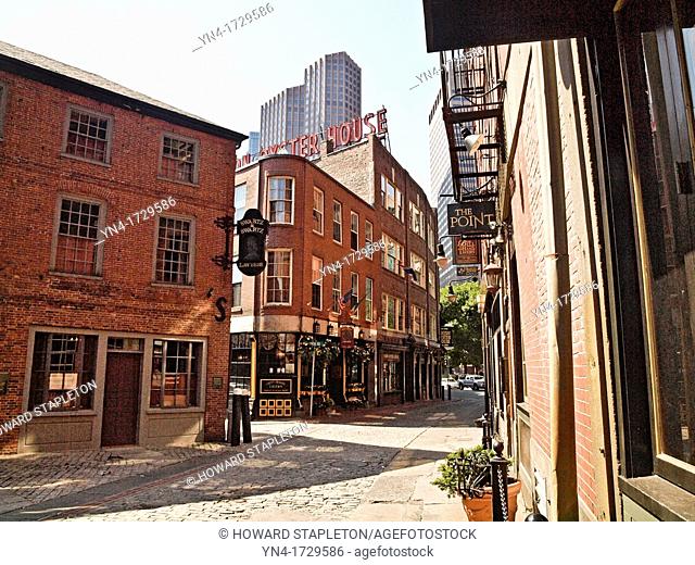 Historic Boston, Massachusetts. This is the oldest neighborhood in Boston and is preserved as it was in the 18th Century A high rise building of modern downtown...