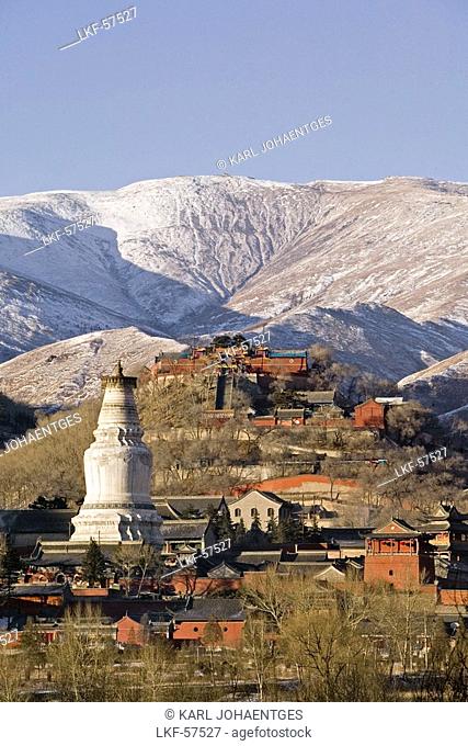 Mountains of Wutai Shan in winter snow, Five Terrace Mountain, Great White Pagoda, Northern Terrace, Buddhist Centre, town of Taihuai, Shanxi province, Asia