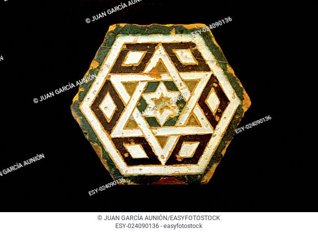 Technique developed by the Moors in the Iberian Peninsula in Spain followed by assimilation of taste for geometric and floral decoration in what is known as a...
