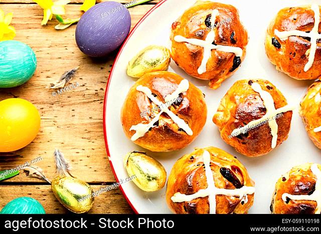 Easter hot cross buns and easter painted eggs