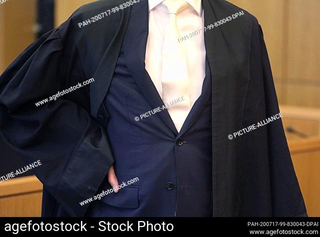 17 July 2020, North Rhine-Westphalia, Aachen: A lawyer stands in the regional court with robe in the courtroom. The serial offender ""Juggernaut Andi"" is on...
