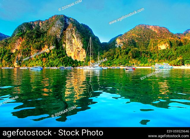 Ao Loh Dalum Bay surrounded by limestone formations on Phi Phi Don Island, Krabi Province, Thailand. Koh Phi Phi Don is part of a marine national park